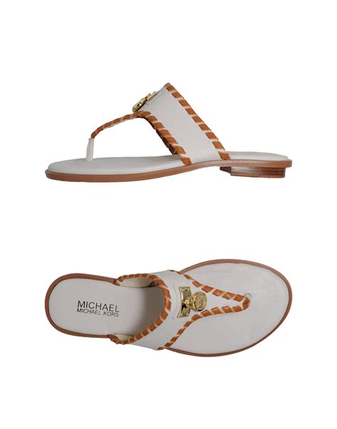 white michael kors flip flops|michael kors women's slides.